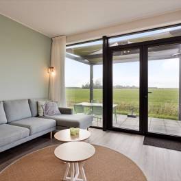 The Woonkamer of nr. 037 - Lodge 4B in Landal Park Wijdenes