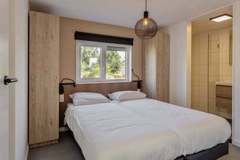 The Slaapkamer 1 of Type Strandlodge 8 - nr. 14 in Vakantiepark Boomhiemke