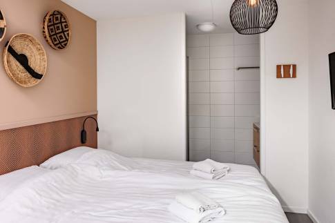 The Slaapkamer of nr. 011 - type Bungalow 6B in Duinresort Dunimar