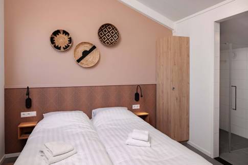 The Slaapkamer of nr. 011 - type Bungalow 6B in Duinresort Dunimar