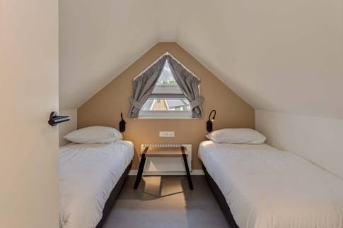 The Slaapkamer 3 of Type Strandlodge 8 - nr. 14 in Vakantiepark Boomhiemke